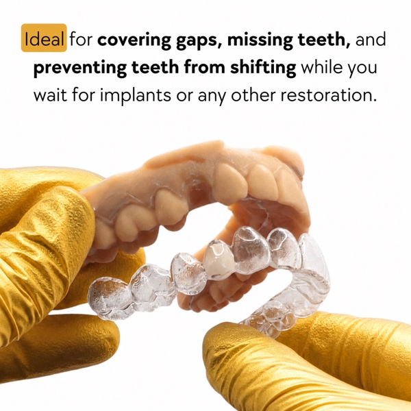 Clear essix retainer held in a gloved hand